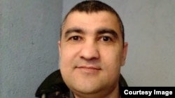 Abror Xidirov deportatsiya markazida tushgan surat.