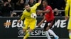 Kazakhstan - Astana's Kazakh forward Sergei Khizhnichenko and Manchester United's defender Ethan Laird vie for the ball during the UEFA Europa League group L football match between Astana and Manchester United in Nur-Sultan on November 28, 2019. (Photo by